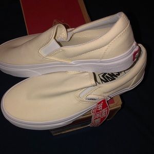 vans slip ons off white